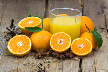 Sticker - orange juice and some fresh fruits on wooden background