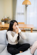 © leungchopan - Woman suffer from influenza at home