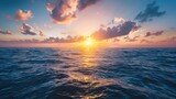 Fototapeta  - Inspirational sunrise shot over a calm sea with a quote about risk and opportunity in investing