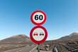 © Rob Wilkinson - Speed Limit 60 kmh and no overtaking signs, roadside in Lanzarote, Canary Islands