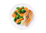 Fototapeta Kuchnia - plate of grilled salmon fillet and vegetables isolated on transparent background, top view