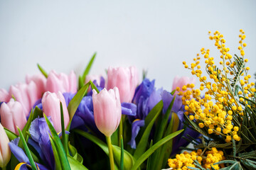 Wall Mural - A spring bouquet of flowers with tulips. International Women's Day or birthday.