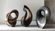 Sculptural forms with a metallic finish