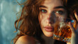 © S photographer - Caucasian woman holding a whiskey glass.