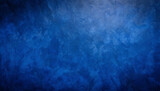 Fototapeta  - A blue texture background, blue plaster wall, with light spots of light, as a background, template, banner or page.