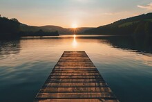 Golden Hour Over A Serene Lake With A Single Wooden Pier Evoking Feelings Of Peace And Solitude Perfect For Contemplative Or Nature-inspired Imagery