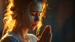© Aiviart - The woman put her hands together and pray