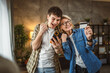 © Miljan Živković - mother and son woman young man shopping online at home use credit card