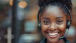 smiling african american young business woman with headset working in call center customer or technical support concept 