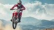 jumping mountain desert motocross race biker in action