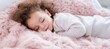 Closeup cute toddler baby sleeping on a cozy bed. Happy toddler child peaceful sleep on a comfortable bed at home. Sweet dreams. Adorable toddler naptime. Family love and tranquility.