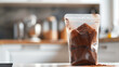 Transparent plastic bag filled with cocoa powder.