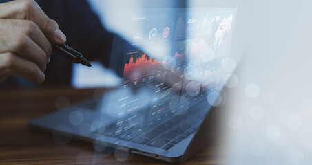 Wall Mural - businessman using computer for data analysis management on visual screen technology. data analysis m