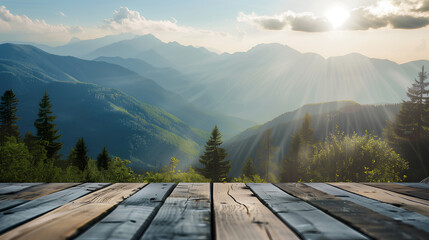 A wooden deck overlooking a mountain range with a clear blue sky. The view is serene and peaceful, with the sun shining brightly on the mountains. The wooden deck is a perfect spot to relax