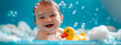 baby bathes in a bath with a duck. Selective focus.