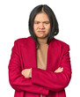 © Asier - Young chinese woman isolated unhappy looking in camera with sarcastic expression.