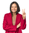 © Asier - Young chinese woman isolated showing number two with fingers.