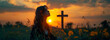 Sunset Serenity: Woman's Silhouette Praying by Cross on Grass