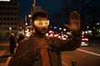 © Westend61 - Man wearing smart glasses gesturing in the street