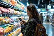 © kilimanjaro  - Woman Using Smartphone for Grocery Shopping List