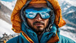 Close-up portrait of a male mountain climber with reflective glacier glasses, beard and mustache looking at camera. 
