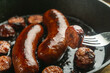 Pan frying precooked juicy smoked sausage with cast iron skillet