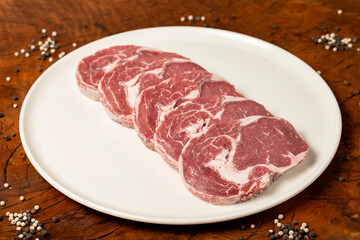 Canvas Print - Raw beef ribeye meat. Butcher products. Fresh beef ribeye meat on dark background