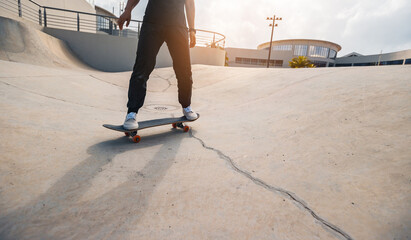 Wall Mural - Skateboarder skateboarding at skatepark in city