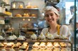 Happy small pastry shop owner smiling proudly at her store, Cheerful female baker working at her shop