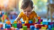 © Saowanee - Little child with brightly colored developmental toys