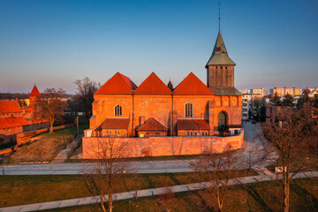 Wall Mural - Church at the castle in Malbork at sunset, Poland