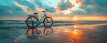 Bicycle Parked On The Beach