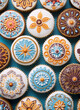 3D rendering of ornate cupcakes with intricate patterns and bright frosting.