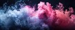 magenta and pink fluffy pastel ink smoke cloud against black background