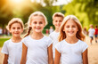 © Екатерина Абатурова - several happy smiling children of European appearance on the playground. a glance at the camera. a sunny afternoon. The concept of a child's day