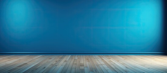 Poster - The empty room features a blue wall with tints and shades, contrasting against the hardwood floor. The electric blue hue creates a striking pattern in the rectangular space