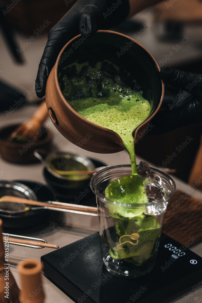 Matcha Making Process Japanese Matcha green tea making process. Female hands pouring matcha ...