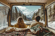 a young couple sitting in ther camper van enjoying the view of snowy mountains