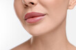 © New Africa - Woman with beautiful lips on white background, closeup