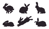 Fototapeta Dinusie - Bunny silhouettes. Easter spring monochrome rabbits, eared Easter hares flat vector illustration set. Cute holidays rabbits silhouette collection