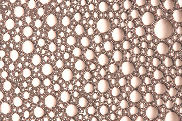 Abstract beige macro background with lots of soap bubbles.