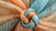 Close-up of a knotted colorful fabric.