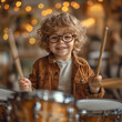 talented young boy learning to play the drums