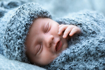 Wall Mural - Cute newborn baby sleeping on blanket, closeup