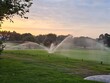 Watering in golf course. Lawn and golf course care and watering ???????
