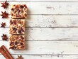 National Raisin & Spice Bar Day.On white wooden old background. Free copy space