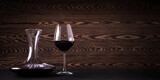Fototapeta Przestrzenne - Decanter and glass with red wine on wooden rustic background