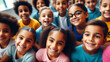 Smiling group of Multi-ethnic children looking at camera and posing together. Diverse different cool school students boys and girls wide angle. Concept diversity and inclusion