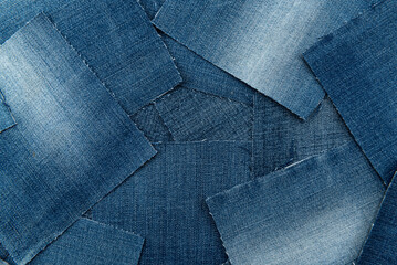 Canvas Print - Texture from torn pieces of denim. Jeans texture. Material for sewing clothes