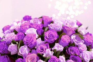 Poster - Bouquet of violet roses against blurred background, closeup. Funeral attributes